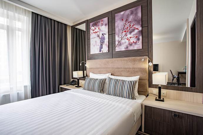 Imagen de la habitación del Hotel Ramada and Suites by Wyndham Novosibirsk Zhukovka. Foto 2