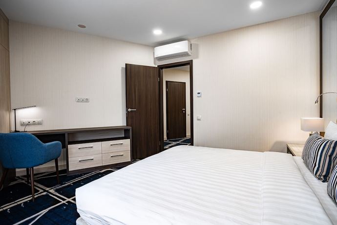 Imagen de la habitación del Hotel Ramada and Suites by Wyndham Novosibirsk Zhukovka. Foto 4
