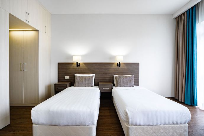 Imagen de la habitación del Hotel Ramada and Suites by Wyndham Novosibirsk Zhukovka. Foto 7