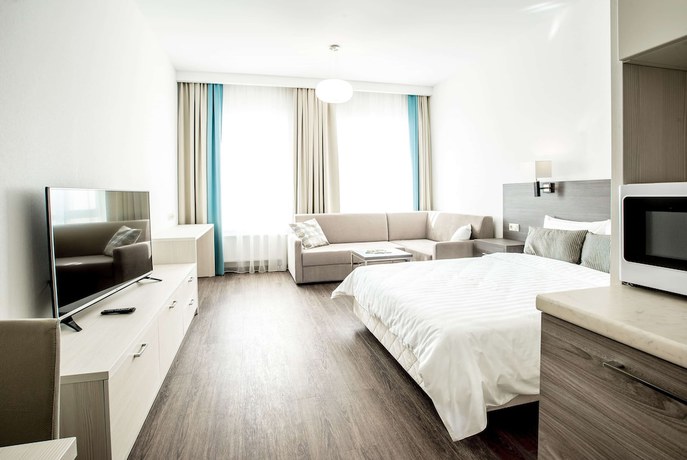 Imagen de la habitación del Hotel Ramada and Suites by Wyndham Novosibirsk Zhukovka. Foto 10