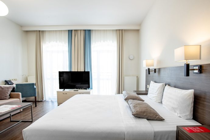 Imagen de la habitación del Hotel Ramada and Suites by Wyndham Novosibirsk Zhukovka. Foto 11