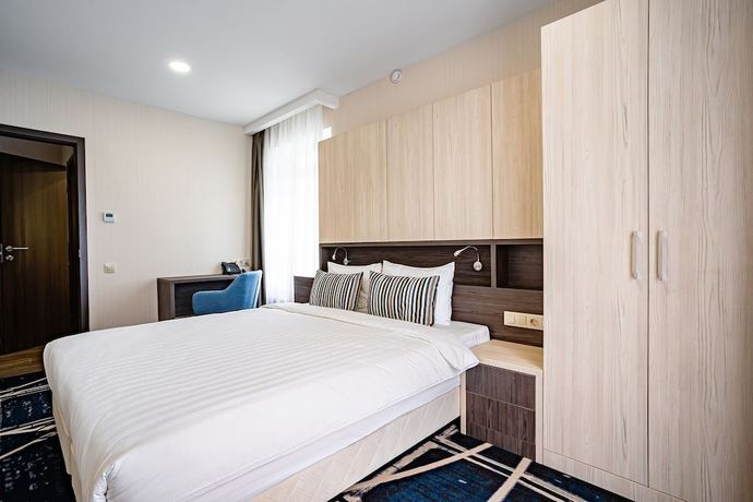 Imagen de la habitación del Hotel Ramada and Suites by Wyndham Novosibirsk Zhukovka. Foto 13