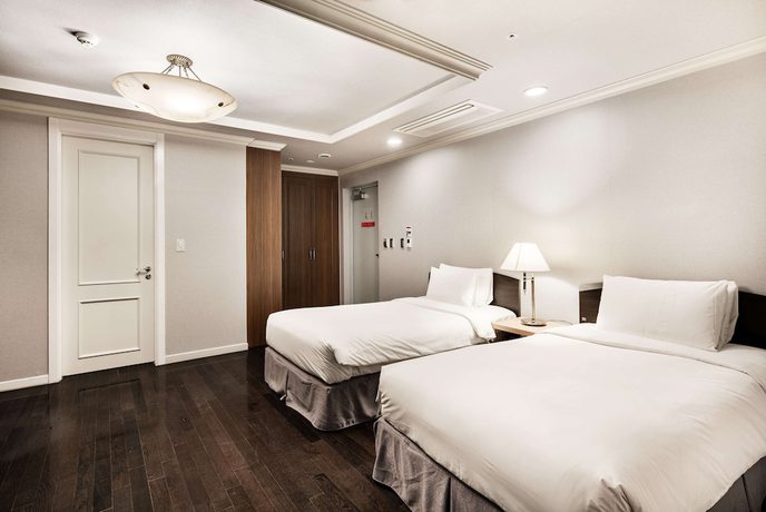 Imagen de la habitación del Hotel Ramada and suites Seoul Namdaemun. Foto 12