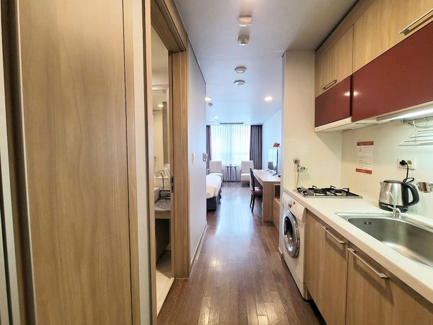 Imagen de la habitación del Hotel Ramada and suites Seoul Namdaemun. Foto 16