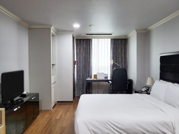 Imagen de la habitación del Hotel Ramada and suites Seoul Namdaemun. Foto 20
