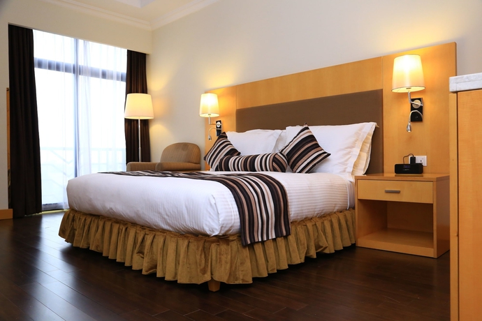 Imagen de la habitación del Hotel Ramada by Wyndham Addis Ababa. Foto 7