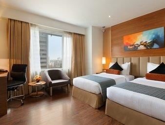 Imagen de la habitación del Hotel Ramada by Wyndham Ahmedabad. Foto 6