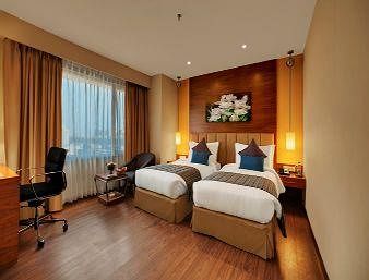 Imagen de la habitación del Hotel Ramada by Wyndham Ahmedabad. Foto 9
