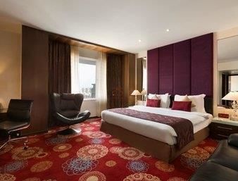Imagen de la habitación del Hotel Ramada by Wyndham Ahmedabad. Foto 12
