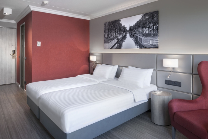 Imagen de la habitación del Hotel Ramada by Wyndham Amsterdam Airport Schiphol. Foto 12