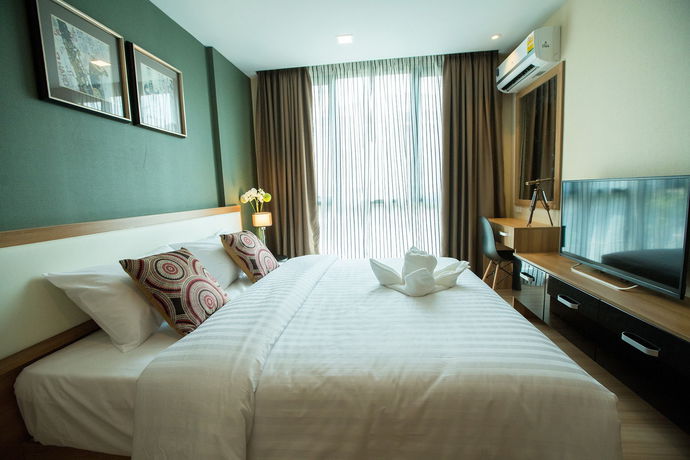 Imagen de la habitación del Hotel Ramada by Wyndham Bangkok Ten Ekamai Residences. Foto 2