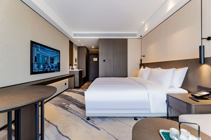 Imagen de la habitación del Hotel Ramada by Wyndham Bayannur. Foto 17