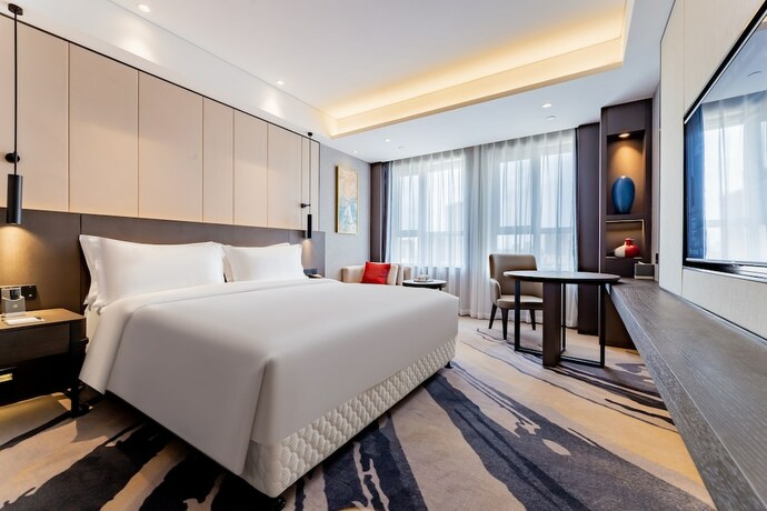 Imagen de la habitación del Hotel Ramada by Wyndham Bayannur. Foto 19