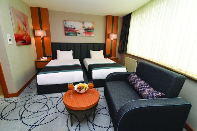 Imagen de la habitación del Hotel Ramada by Wyndham Bursa Nilufer. Foto 16