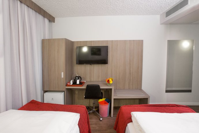 Imagen de la habitación del Hotel Ramada by Wyndham Campinas Viracopos. Foto 8