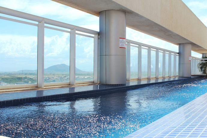 Imagen de la piscina del Hotel Ramada by Wyndham Campos dos Goytacazes Hotel & Suites. Foto 18