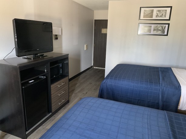 Imagen de la habitación del Hotel Ramada by Wyndham Cedar Rapids South. Foto 11