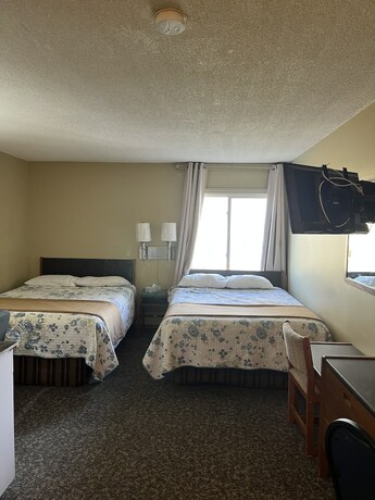 Imagen de la habitación del Hotel Ramada by Wyndham Dawson Creek. Foto 12