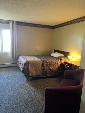 Imagen de la habitación del Hotel Ramada by Wyndham Dawson Creek. Foto 19