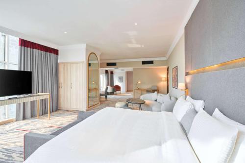 Imagen de la habitación del Hotel Ramada by Wyndham Doha Old Town. Foto 8