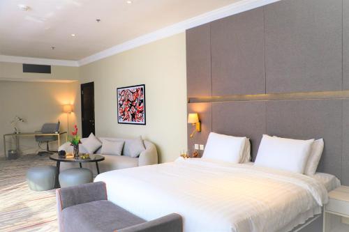 Imagen de la habitación del Hotel Ramada by Wyndham Doha Old Town. Foto 11