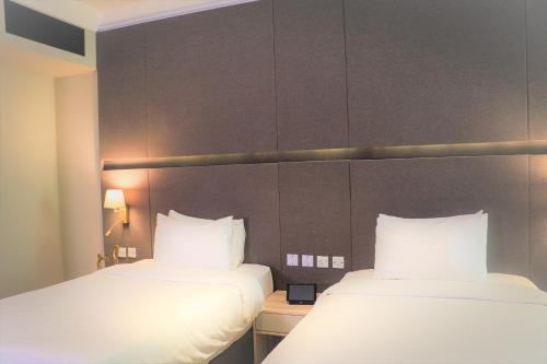 Imagen de la habitación del Hotel Ramada by Wyndham Doha Old Town. Foto 13