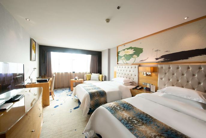 Imagen de la habitación del Hotel Ramada by Wyndham Encore Kaili West. Foto 7