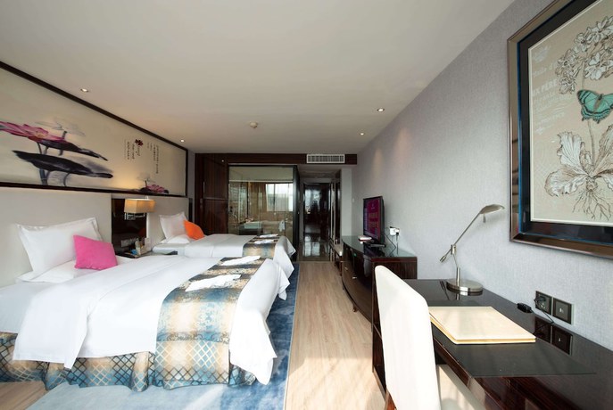 Imagen de la habitación del Hotel Ramada by Wyndham Encore Kaili West. Foto 10