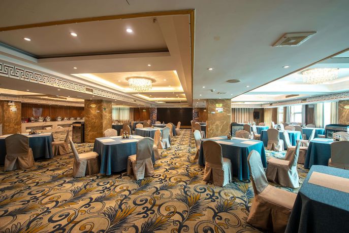 Imagen del bar/restaurante del Hotel Ramada by Wyndham Encore Kaili West. Foto 5