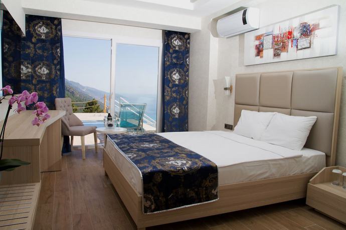 Imagen de la habitación del Hotel Ramada by Wyndham Fethiye Oludeniz. Foto 3