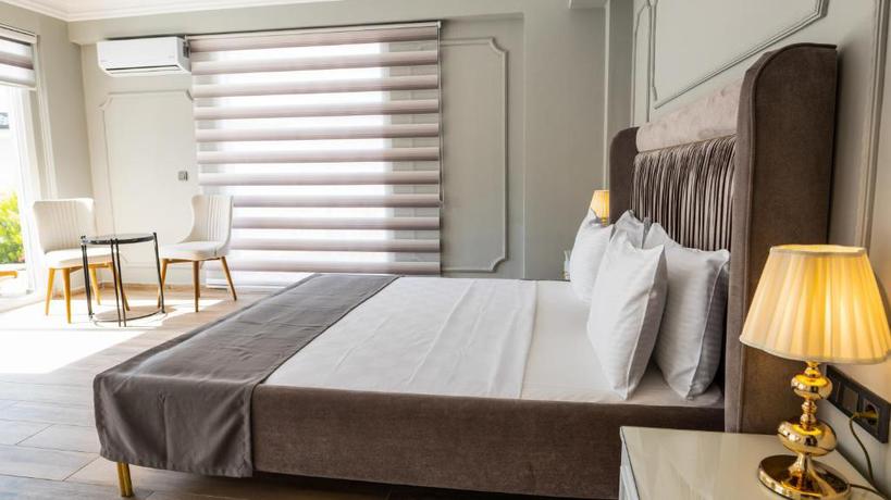 Imagen de la habitación del Hotel Ramada by Wyndham Fethiye Oludeniz. Foto 7