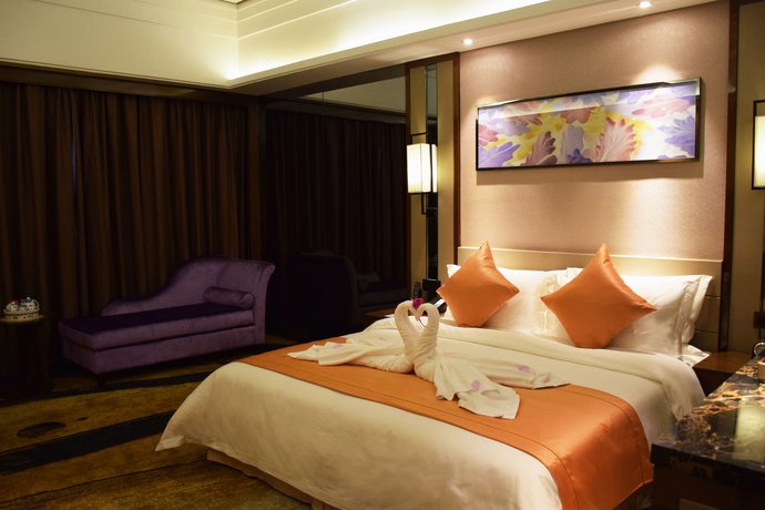 Imagen de la habitación del Hotel Ramada by Wyndham Foshan. Foto 3