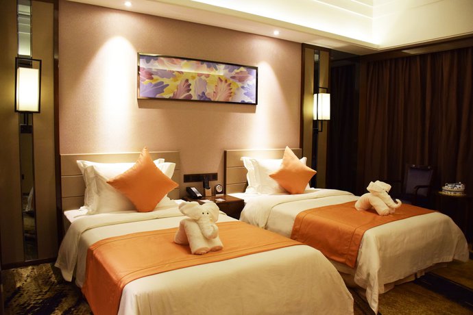 Imagen de la habitación del Hotel Ramada by Wyndham Foshan. Foto 5