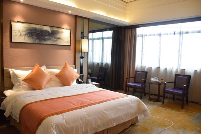 Imagen de la habitación del Hotel Ramada by Wyndham Foshan. Foto 8