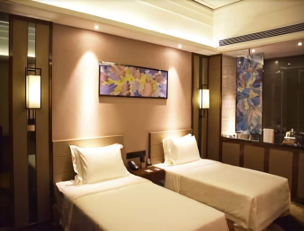 Imagen del bar/restaurante del Hotel Ramada by Wyndham Foshan. Foto 2