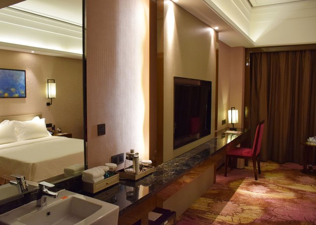 Imagen de la habitación del Hotel Ramada by Wyndham Foshan. Foto 18