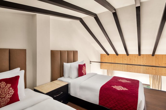 Imagen de la habitación del Hotel Ramada by Wyndham Gangtok Hotel & Casino Golden. Foto 1