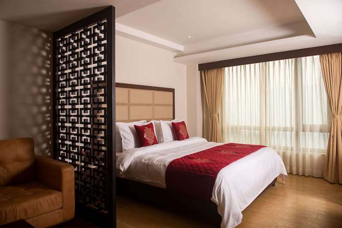 Imagen de la habitación del Hotel Ramada by Wyndham Gangtok Hotel & Casino Golden. Foto 11