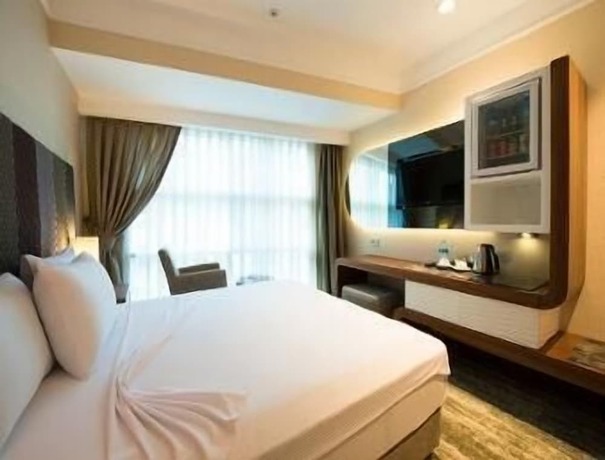 Imagen de la habitación del Hotel Ramada by Wyndham Gemlik. Foto 9