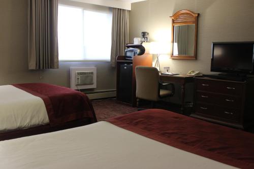 Imagen de la habitación del Hotel Ramada by Wyndham Grand Forks. Foto 5