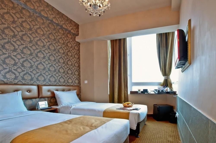 Imagen de la habitación del Hotel Ramada by Wyndham Hong Kong Harbour View. Foto 5