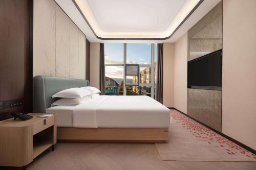 Imagen general del Hotel Ramada by Wyndham Honghe Kaiyuan. Foto 2