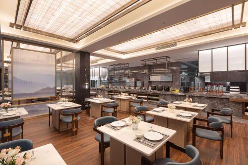 Imagen general del Hotel Ramada by Wyndham Honghe Kaiyuan. Foto 8