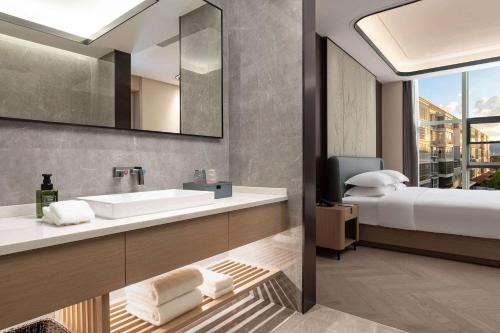 Imagen general del Hotel Ramada by Wyndham Honghe Kaiyuan. Foto 11