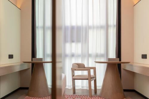 Imagen general del Hotel Ramada by Wyndham Honghe Kaiyuan. Foto 14