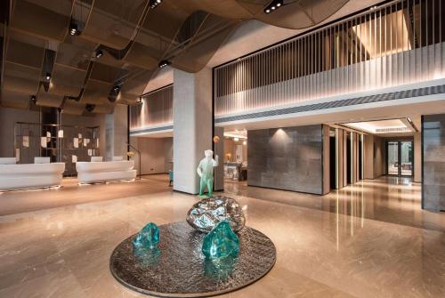 Imagen general del Hotel Ramada by Wyndham Huizhou Double Moon Bay. Foto 6