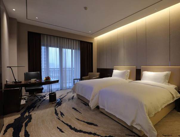 Imagen de la habitación del Hotel Ramada by Wyndham Huizhou South. Foto 5
