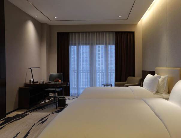 Imagen de la habitación del Hotel Ramada by Wyndham Huizhou South. Foto 6