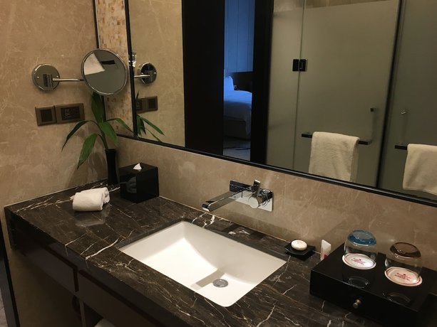 Imagen de la habitación del Hotel Ramada by Wyndham Huizhou South. Foto 8