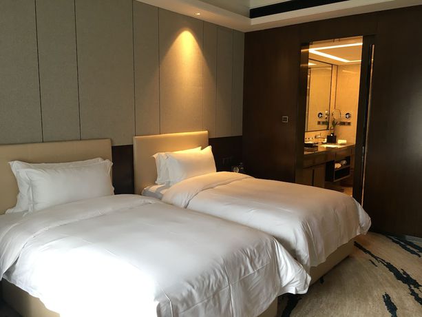 Imagen de la habitación del Hotel Ramada by Wyndham Huizhou South. Foto 12